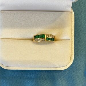 Elegant 14KT YellowGold Emerald and Diamond ring